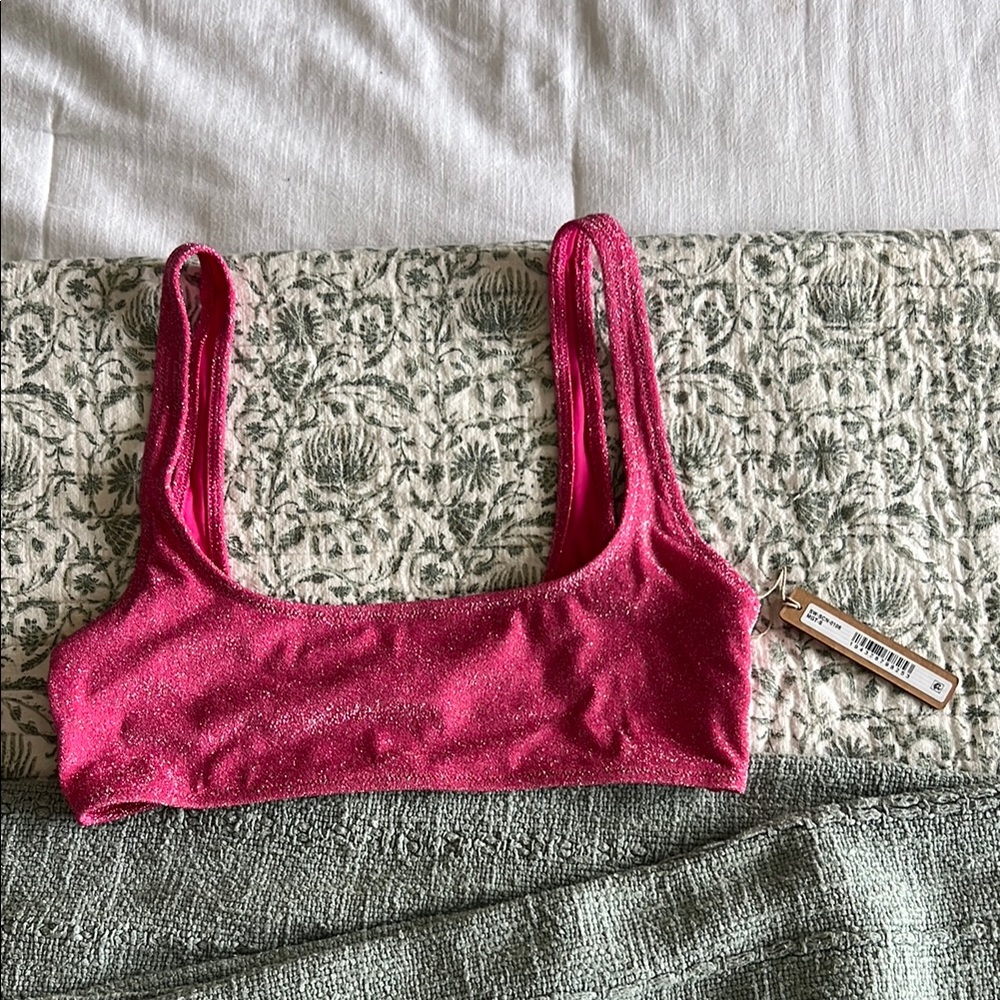 Glitter Skims Scoop Bikini Top in magenta.